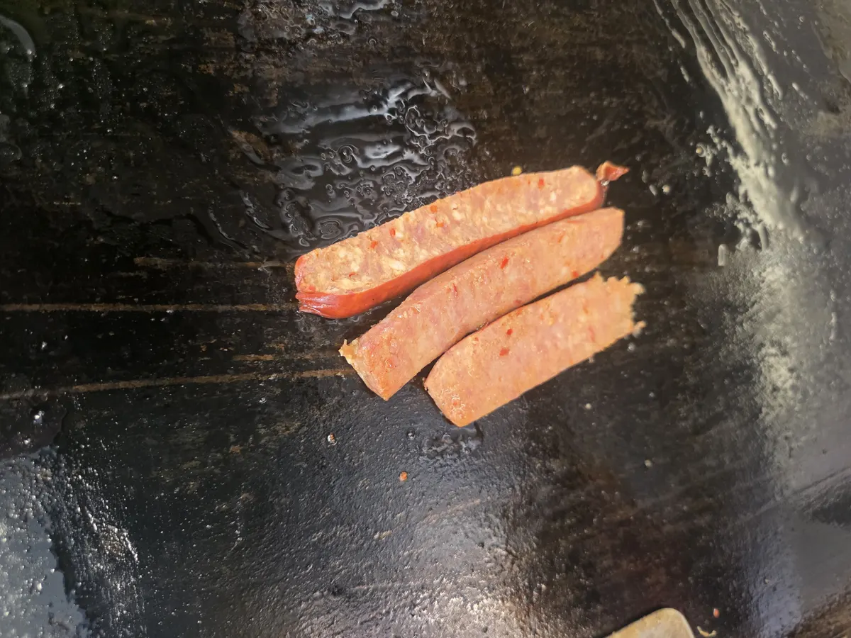 The signature hotlink split lengthwise, working on the griddle