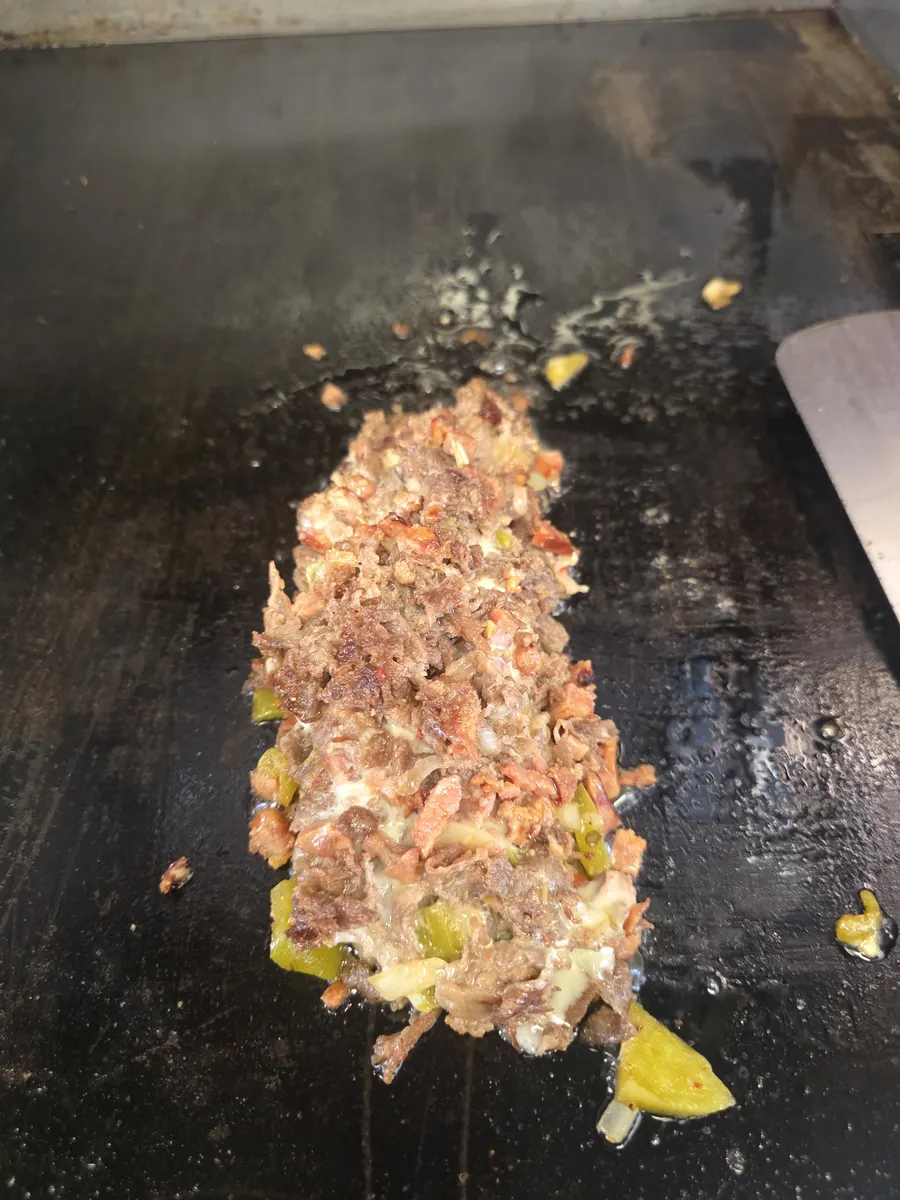 Everything chopped through together on the flat top